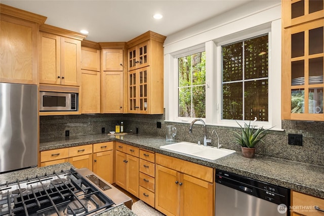 473 Glen Hollow Pl SW, Bainbridge Island, WA 98110 - kitchen featuring stainless steel appliances, tasteful backsplash, glass insert cabinets, dark countertops, and recessed lighting