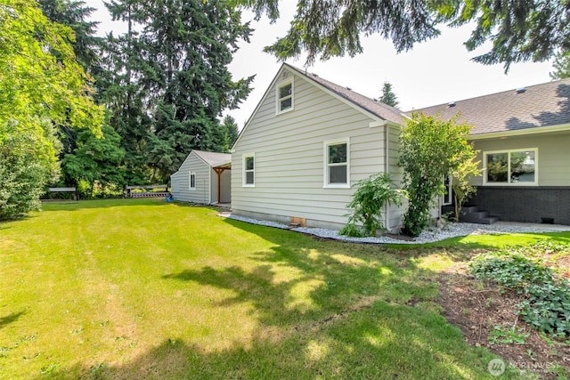 318 Mill Ave SE, Orting, WA 98360 - back of house with a yard