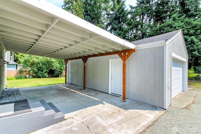 318 Mill Ave SE, Orting, WA 98360 - view of vehicle parking with a garage