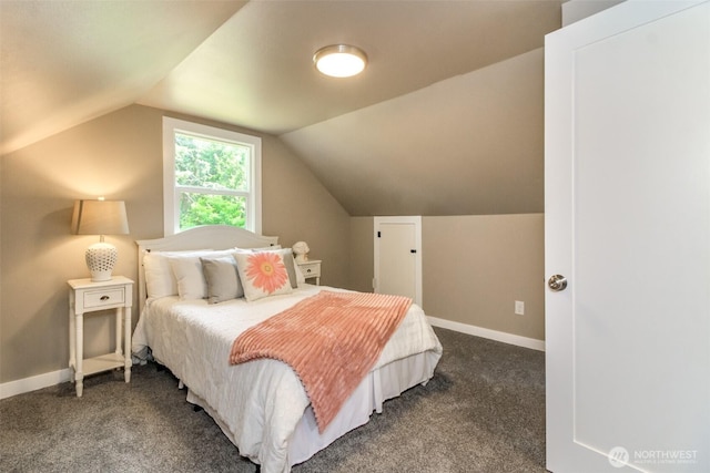 318 Mill Ave SE, Orting, WA 98360 - carpeted bedroom featuring lofted ceiling and baseboards