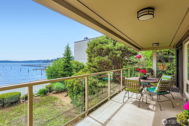 9727 NE Juanita Dr Unit 201, Kirkland, WA 98034 - balcony featuring a water view