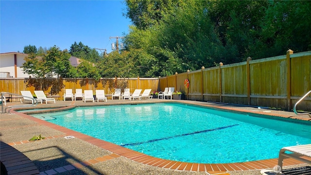 9727 NE Juanita Dr Unit 201, Kirkland, WA 98034 - view of pool with a patio area and a pool with connected hot tub