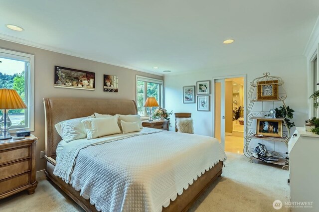 9727 NE Juanita Dr Unit 201, Kirkland, WA 98034 - bedroom with light colored carpet, recessed lighting, ornamental molding, and ensuite bathroom