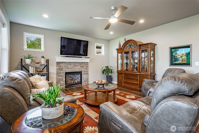 5417 Ocean Mist Loop, Blaine, WA 98230 - living area featuring a ceiling fan, wood finished floors, a stone fireplace, and recessed lighting