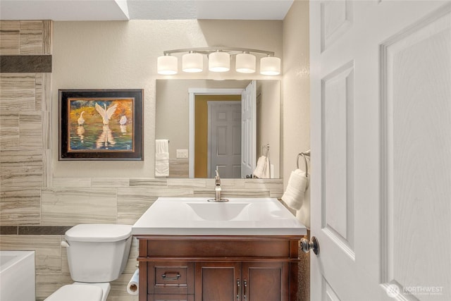 118 W Winesap Rd, Bothell, WA 98012 - bathroom with tile walls, vanity, and a tub