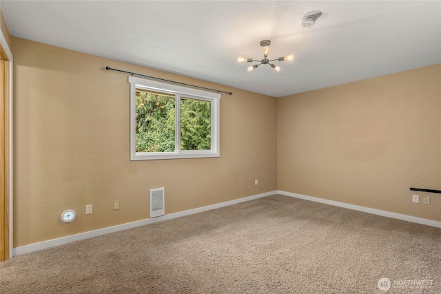 118 W Winesap Rd, Bothell, WA 98012 - unfurnished room with a chandelier, carpet floors, and a smoke detector