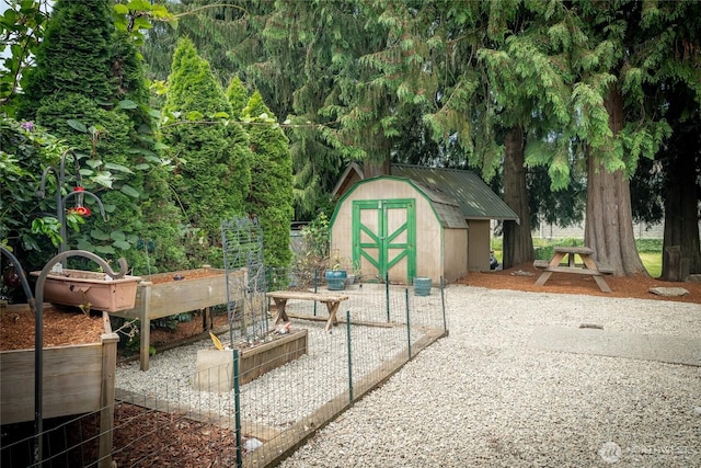 118 W Winesap Rd, Bothell, WA 98012 - view of patio / terrace featuring a storage unit and a garden
