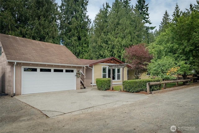 118 W Winesap Rd, Bothell, WA 98012 - view of front of home with concrete driveway, an attached garage, and a shingled roof