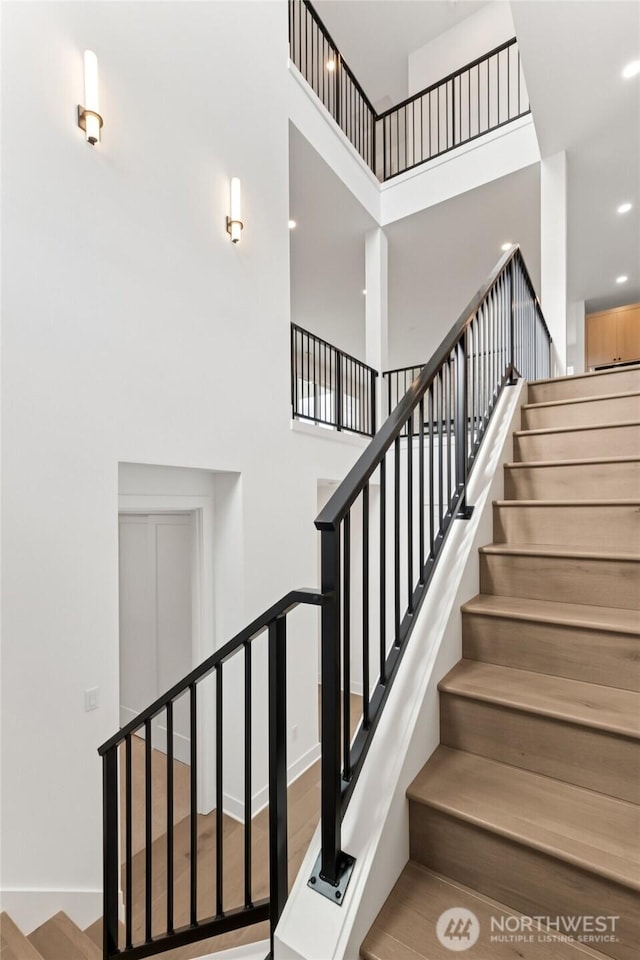 8517 137th Ave SE Unit 1, Newcastle, WA 98059 - stairs featuring a high ceiling