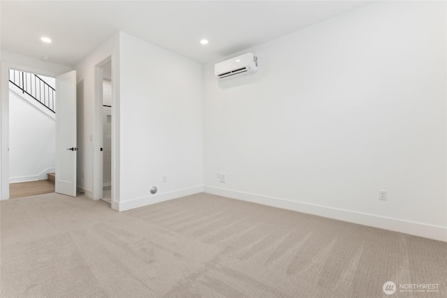 8517 137th Ave SE Unit 1, Newcastle, WA 98059 - spare room with light carpet, a wall mounted AC, recessed lighting, and stairs