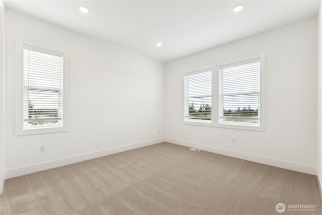 8517 137th Ave SE Unit 1, Newcastle, WA 98059 - empty room with light colored carpet and recessed lighting