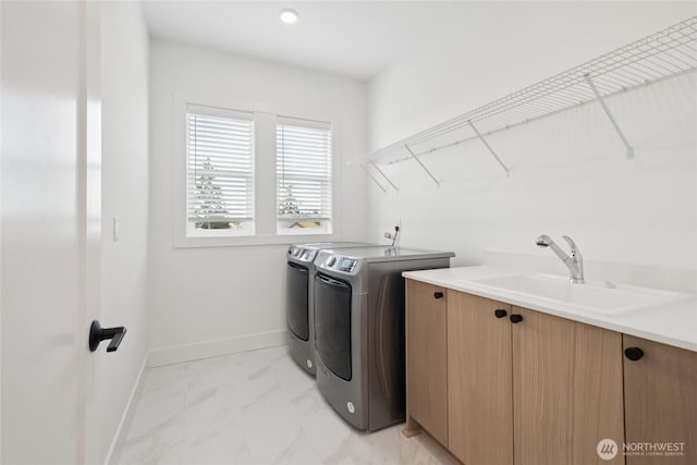 8517 137th Ave SE Unit 1, Newcastle, WA 98059 - laundry area with washer and dryer and light marble finish flooring