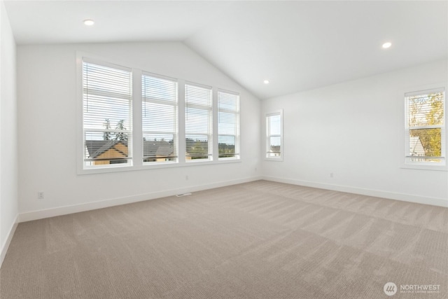 8517 137th Ave SE Unit 1, Newcastle, WA 98059 - unfurnished room featuring light colored carpet, vaulted ceiling, and recessed lighting