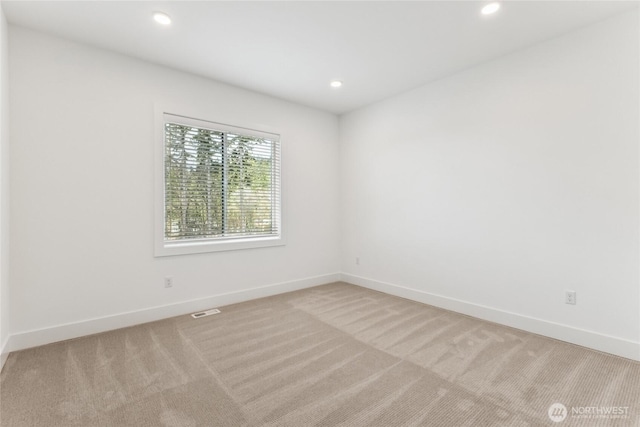 8517 137th Ave SE Unit 1, Newcastle, WA 98059 - unfurnished room with light carpet and recessed lighting