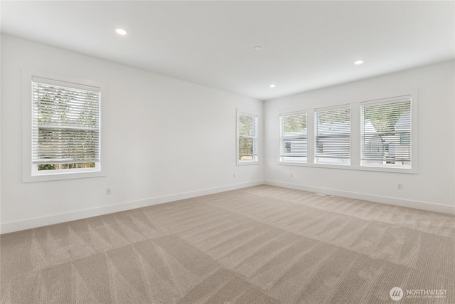 8517 137th Ave SE Unit 1, Newcastle, WA 98059 - spare room featuring plenty of natural light, light colored carpet, and recessed lighting