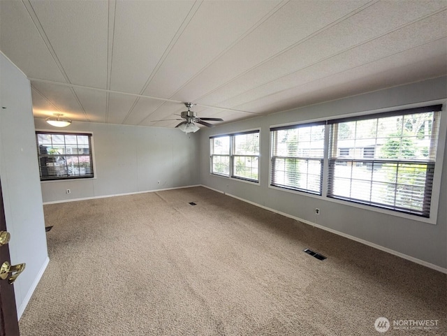 201 Union Ave SE Unit 92, Renton, WA 98059 - carpeted empty room with plenty of natural light and a ceiling fan