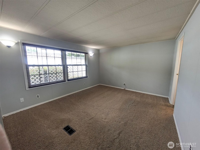 201 Union Ave SE Unit 92, Renton, WA 98059 - carpeted spare room featuring a textured ceiling and baseboards