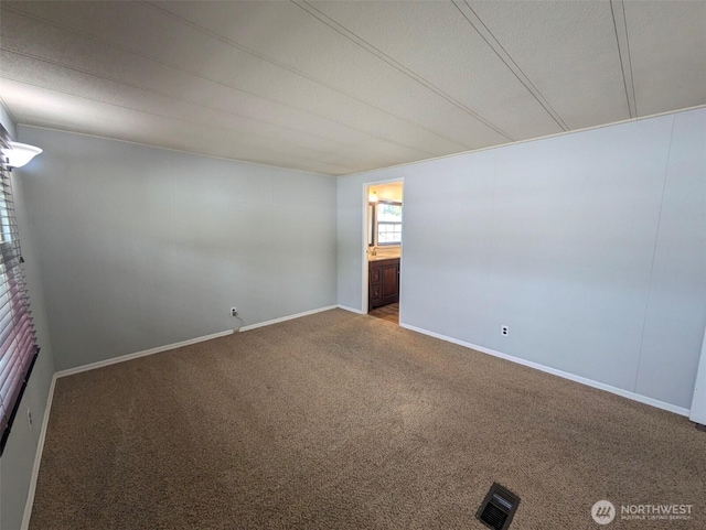 201 Union Ave SE Unit 92, Renton, WA 98059 - carpeted spare room with baseboards