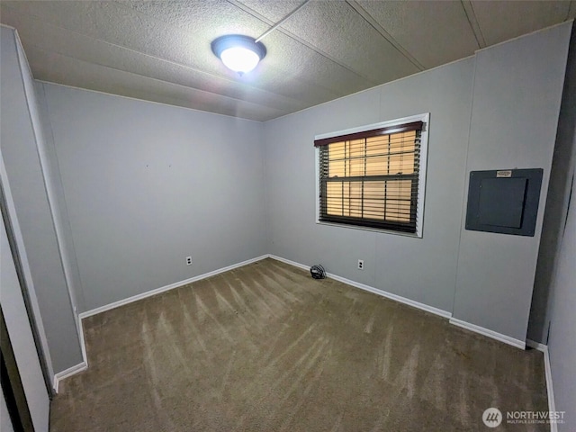 201 Union Ave SE Unit 92, Renton, WA 98059 - carpeted empty room featuring electric panel and baseboards