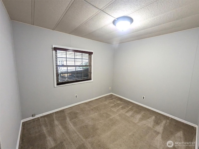 201 Union Ave SE Unit 92, Renton, WA 98059 - spare room featuring carpet and baseboards