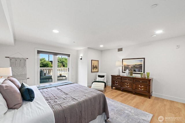 745 Bellevue Ave E Unit 201, Seattle, WA 98102 - bedroom with access to exterior, light wood-type flooring, and recessed lighting