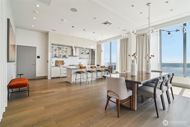 2510 6th Ave Unit 1010, Seattle, WA 98121 - dining space with healthy amount of natural light and light wood finished floors