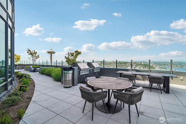 2510 6th Ave Unit 1010, Seattle, WA 98121 - view of patio with exterior kitchen and outdoor dining space