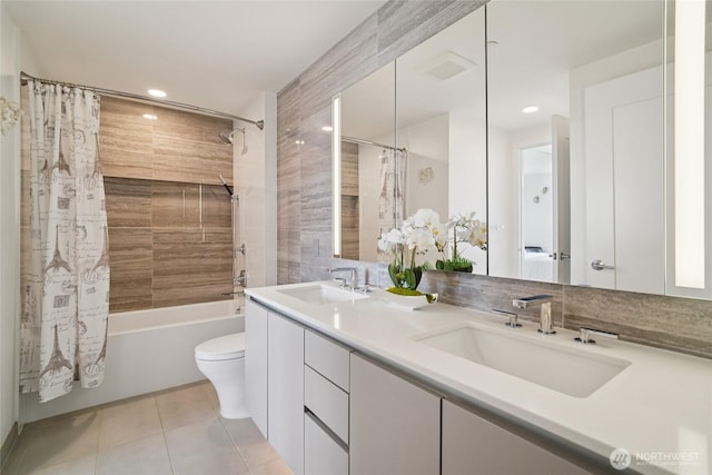 2510 6th Ave Unit 1010, Seattle, WA 98121 - full bathroom featuring shower / bath combination with curtain, tile patterned flooring, recessed lighting, and double vanity