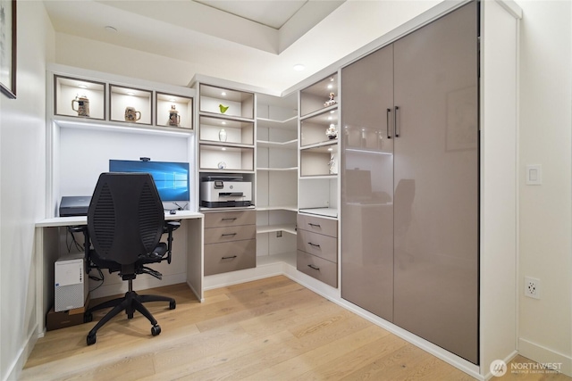 2510 6th Ave Unit 1010, Seattle, WA 98121 - home office featuring light wood finished floors and baseboards