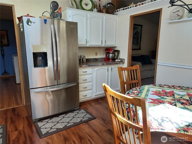 8430 15th Pl SE Unit 33, Lake Stevens, WA 98258 - kitchen featuring stainless steel fridge, white cabinetry, dark countertops, and dark wood-type flooring