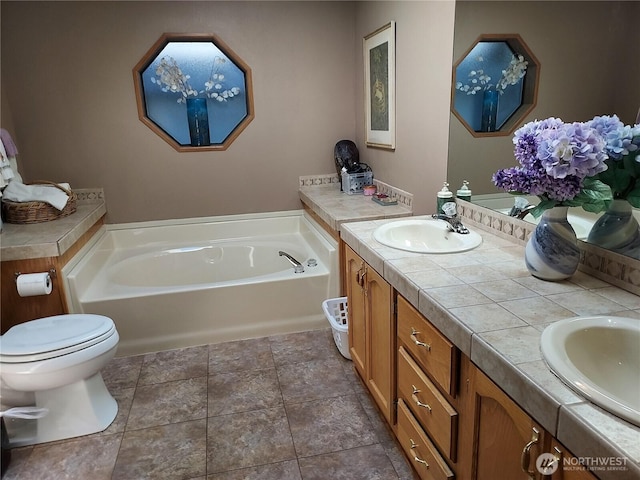 8430 15th Pl SE Unit 33, Lake Stevens, WA 98258 - full bathroom with a garden tub and double vanity