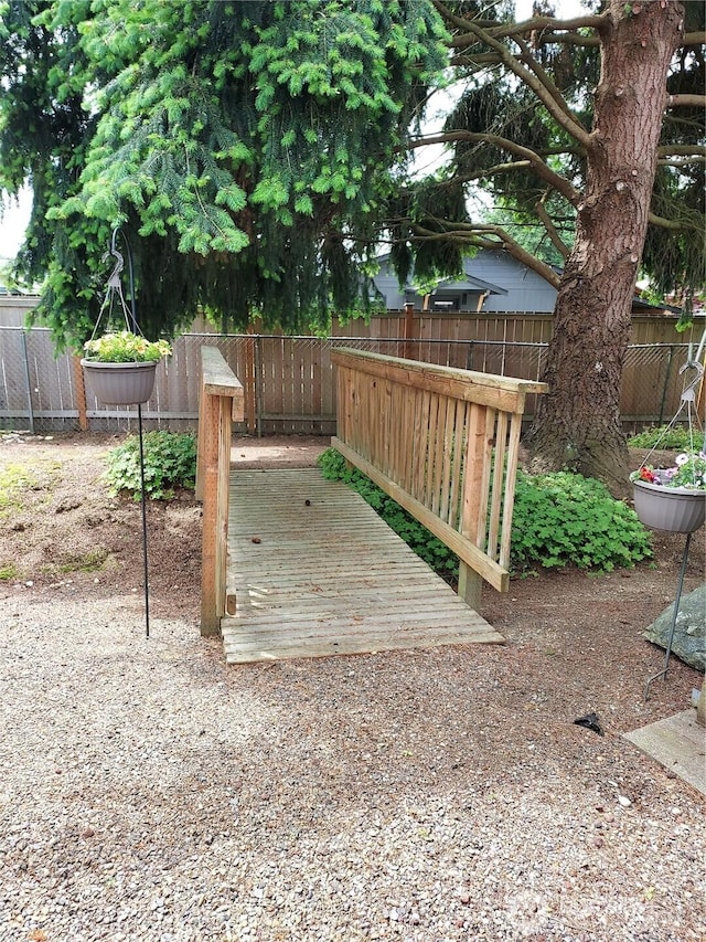 8430 15th Pl SE Unit 33, Lake Stevens, WA 98258 - wooden deck with a fenced backyard