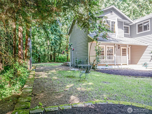4616 140th St NW, Marysville, WA 98271 - view of front facade with a porch and a front yard