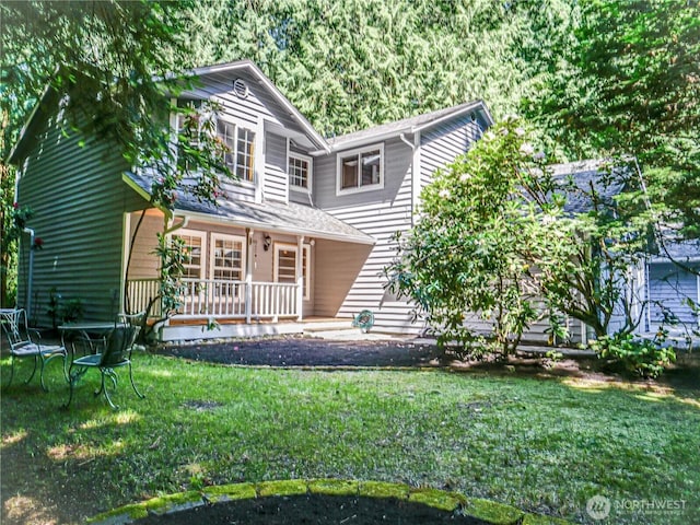 4616 140th St NW, Marysville, WA 98271 - view of front of home featuring a front yard and a trampoline