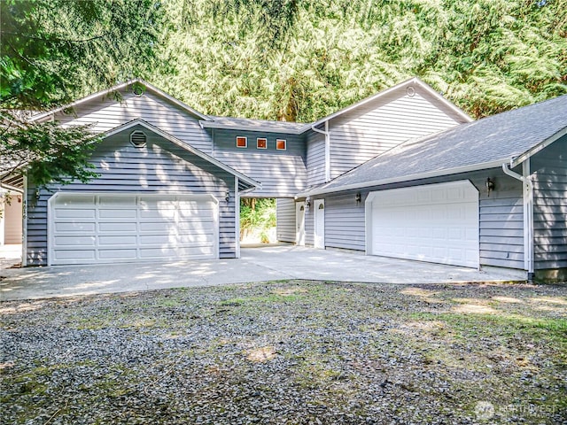 4616 140th St NW, Marysville, WA 98271 - view of front of property featuring driveway and an attached garage