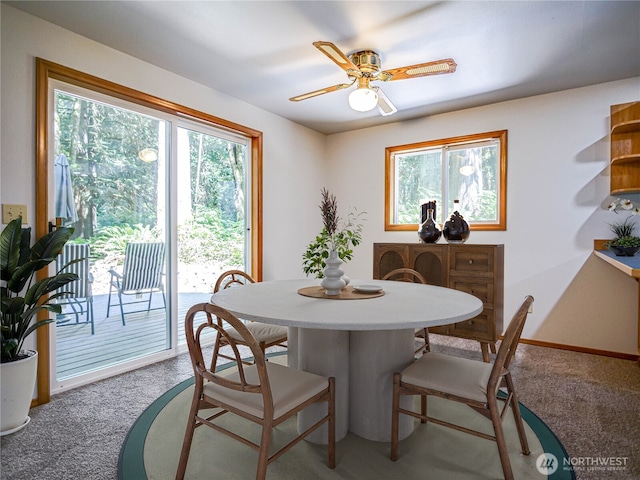 4616 140th St NW, Marysville, WA 98271 - dining area with carpet flooring and ceiling fan
