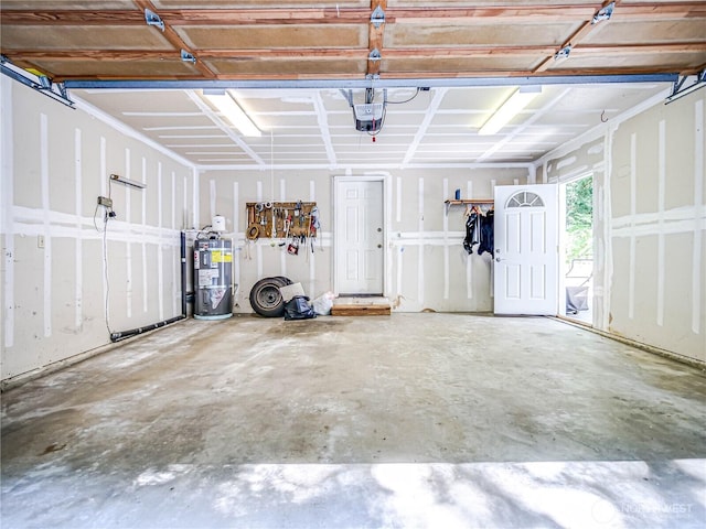4616 140th St NW, Marysville, WA 98271 - garage featuring water heater and a garage door opener