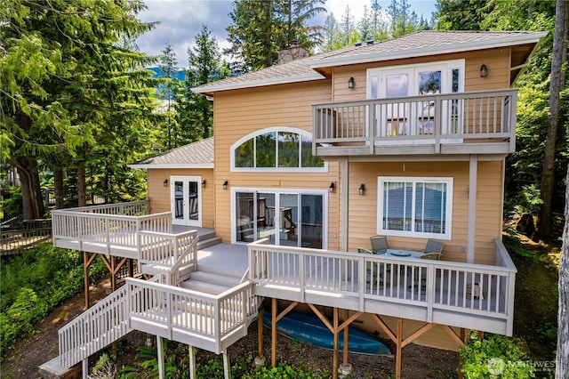 33571 Cliff Rd, Mount Vernon, WA 98274 - rear view of property with a balcony, a chimney, a shingled roof, stairway, and a deck