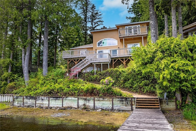 33571 Cliff Rd, Mount Vernon, WA 98274 - rear view of property featuring stairway, a deck, and a balcony