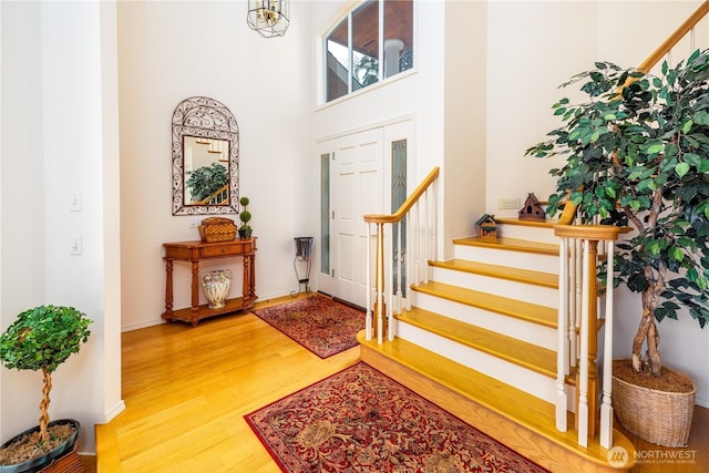 33571 Cliff Rd, Mount Vernon, WA 98274 - foyer entrance with wood finished floors, stairs, and a towering ceiling