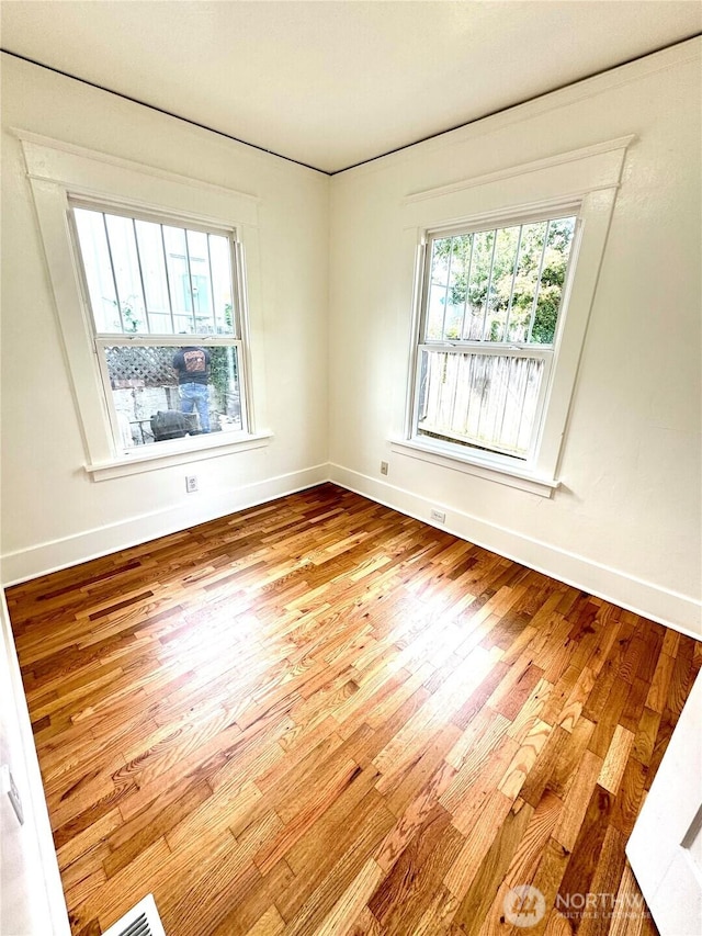 608 N Puget Sound Ave, Tacoma, WA 98406 - empty room with wood finished floors