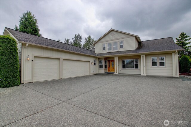 1218 Alpine View Dr, Mount Vernon, WA 98274 - traditional home with driveway, a garage, and a shingled roof