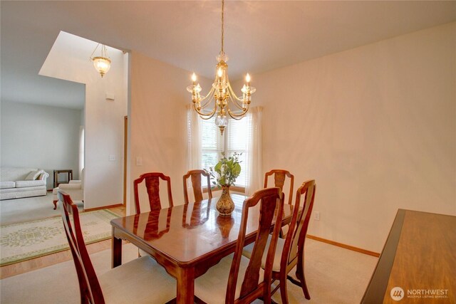 1218 Alpine View Dr, Mount Vernon, WA 98274 - dining room with light carpet and a chandelier