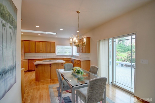 1218 Alpine View Dr, Mount Vernon, WA 98274 - dining room featuring light wood finished floors, a chandelier, and recessed lighting