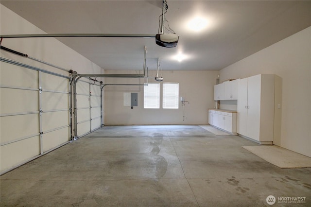 1218 Alpine View Dr, Mount Vernon, WA 98274 - garage with a garage door opener and electric panel