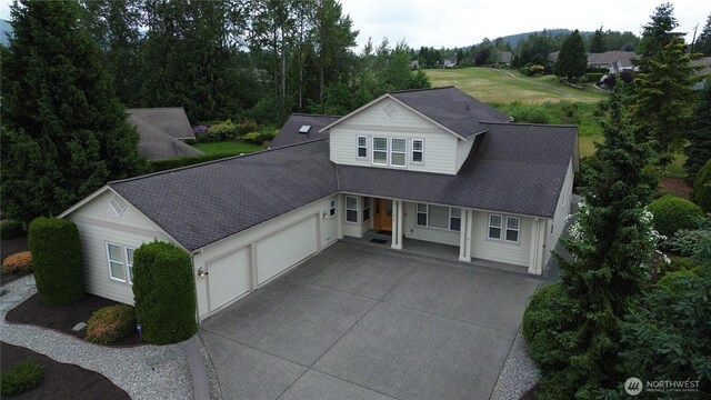 1218 Alpine View Dr, Mount Vernon, WA 98274 - view of front of home featuring an attached garage, driveway, and a shingled roof