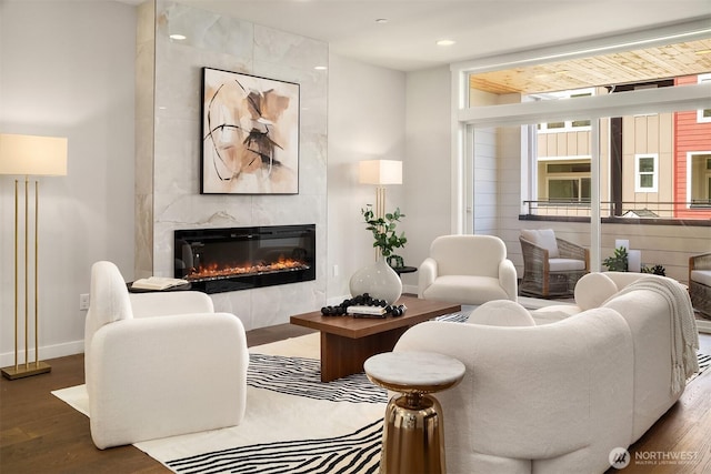 19722 Filbert Dr Unit A-4, Bothell, WA 98012 - living area featuring a tile fireplace, wood finished floors, and recessed lighting
