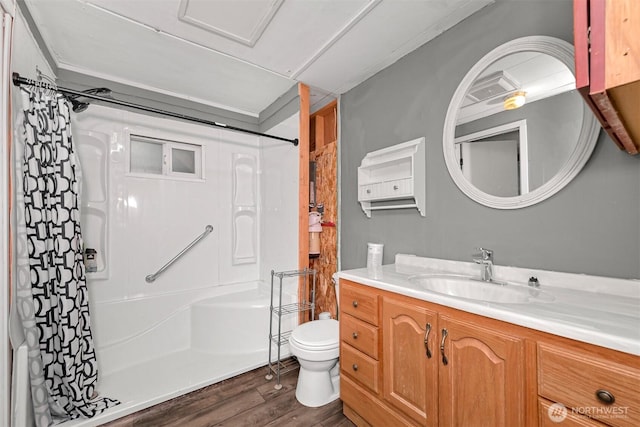 8283 Golden Valley Blvd, Maple Falls, WA 98266 - full bath featuring vanity, wood finished floors, and shower / bath combination with curtain