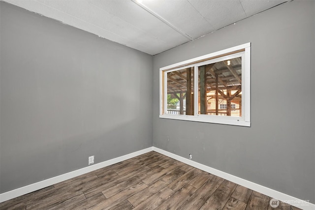 8283 Golden Valley Blvd, Maple Falls, WA 98266 - empty room with dark wood finished floors and baseboards