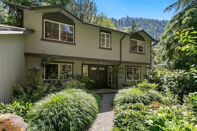 24016 SE 111th St, Issaquah, WA 98027 - view of front facade with a mountain view
